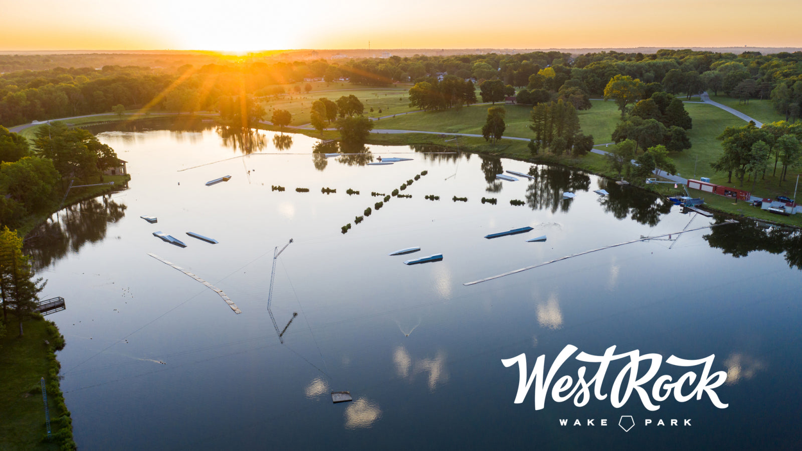 Aerial view of the West Rock Wake Park at sunset.