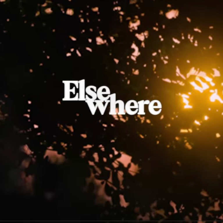 Text 'Elsewhere' with a fiery background and falling leaves.
