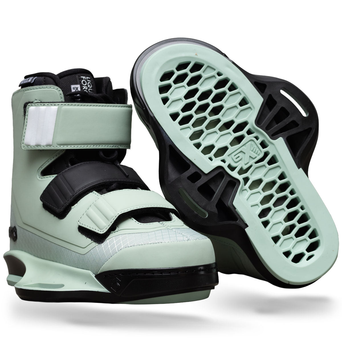 Angled view of Hook 6X binding in sage green with black straps and matching sole.