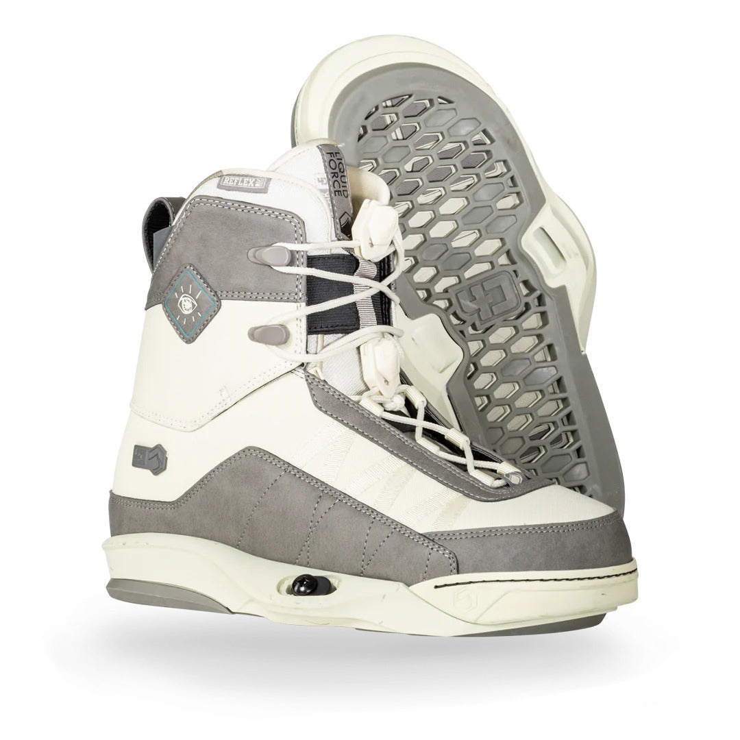 Pair of 23 Peak 4D bindings: gray, white, and black with sturdy soles and laces.