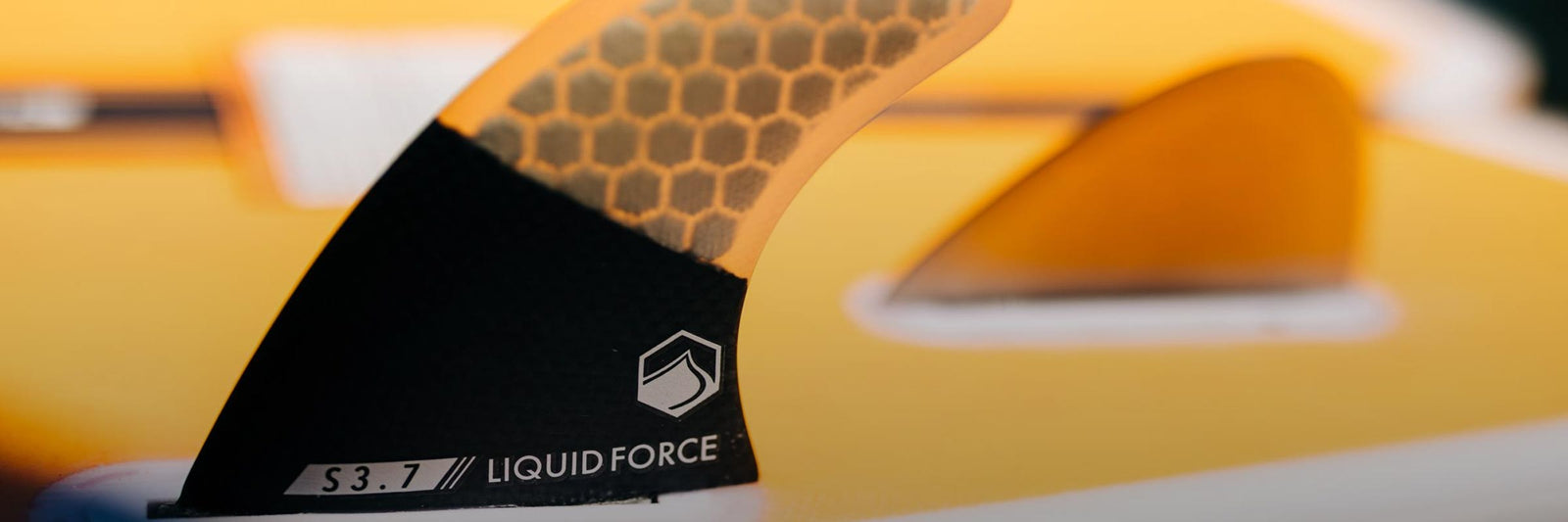 Liquid Force Fins and Parts Collection - close up picture of a wakesurf board's fin