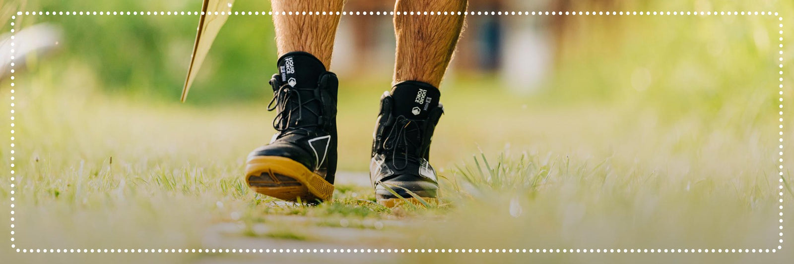 Liquid Force Clearance Binding Collection - Closeup shot of someone walking in LF Terra Trek Walk Liners at a cable park.