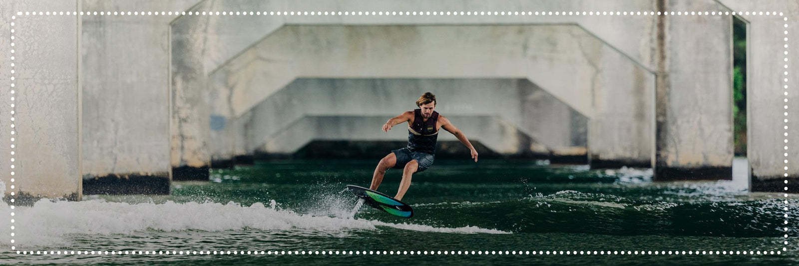 Liquid Force Clearance Foil Collection - LF Athlete Harley Clifford foiling under an overpass.