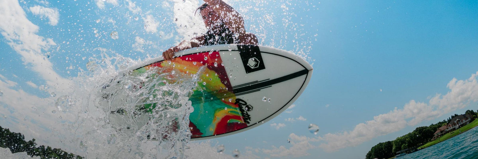 Liquid Force Wakesurf Collection - Closeup shot of LF Athlete Jake Caster riding a wakesurf board