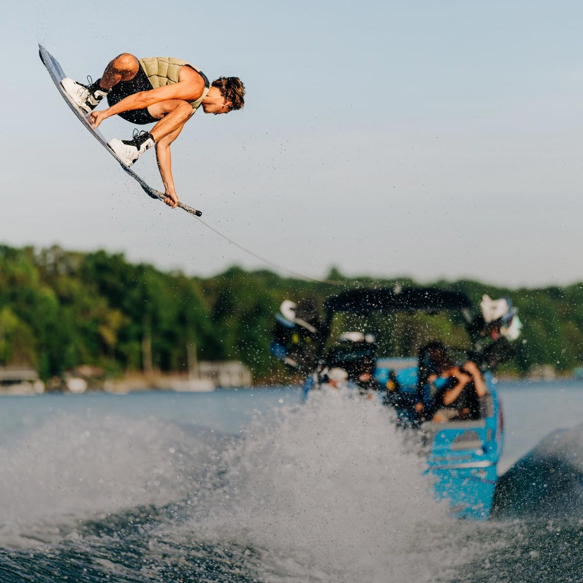 Liquid Force Boat Wakeboard Collection - LF Athlete Sam Brown grabbing his board in the air