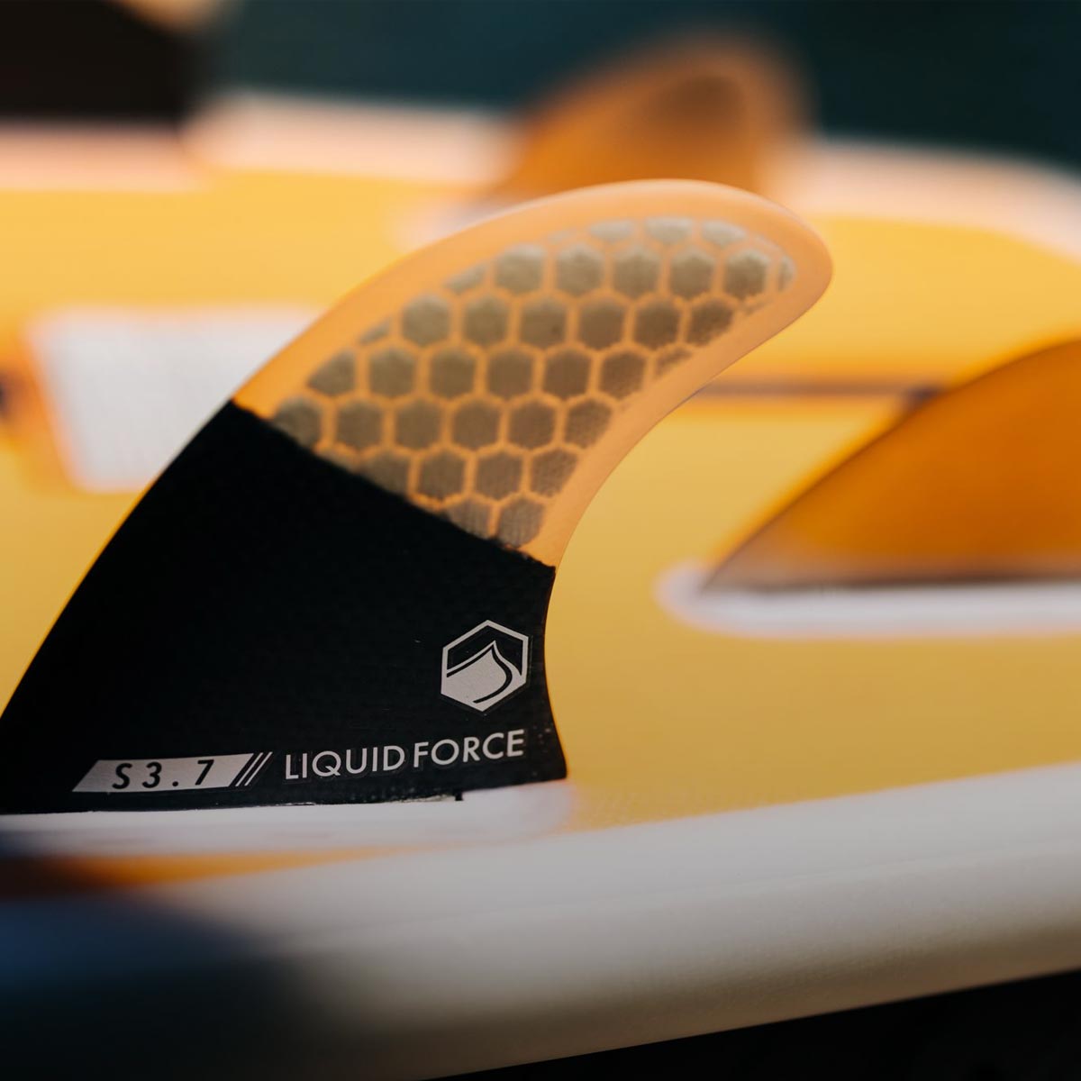 Liquid Force Fins and Parts Collection - close up picture of a wakesurf board's fin