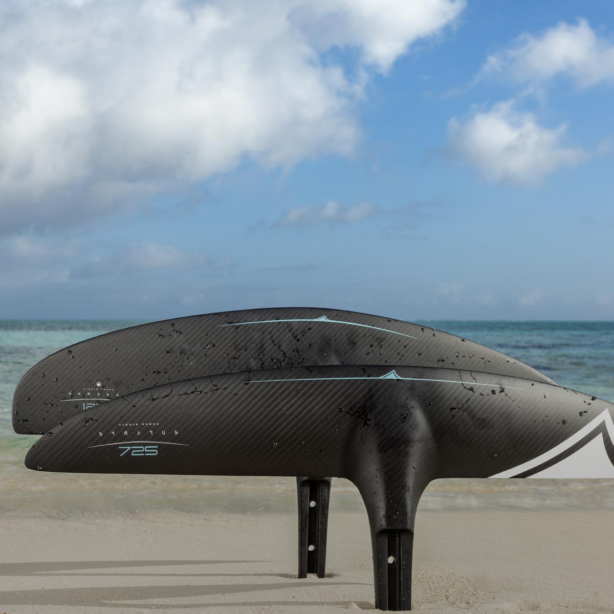 Liquid Force Foil Component Collection - Closeup shot of two LF FuseLock Front Wings posed on the beach