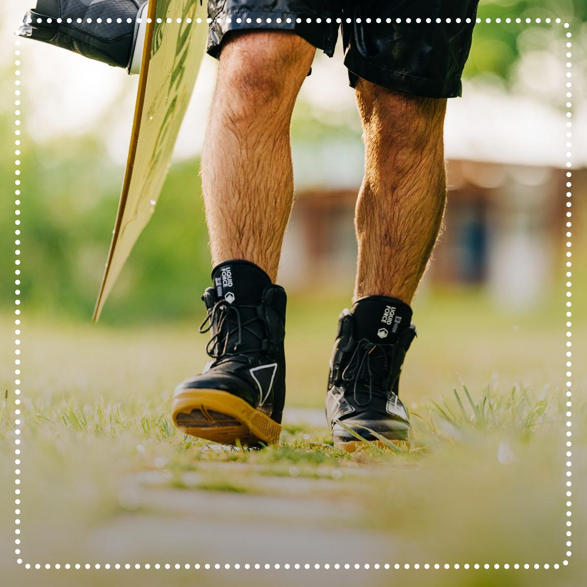 Liquid Force Clearance Binding Collection - Closeup shot of someone walking in LF Terra Trek Walk Liners at a cable park.