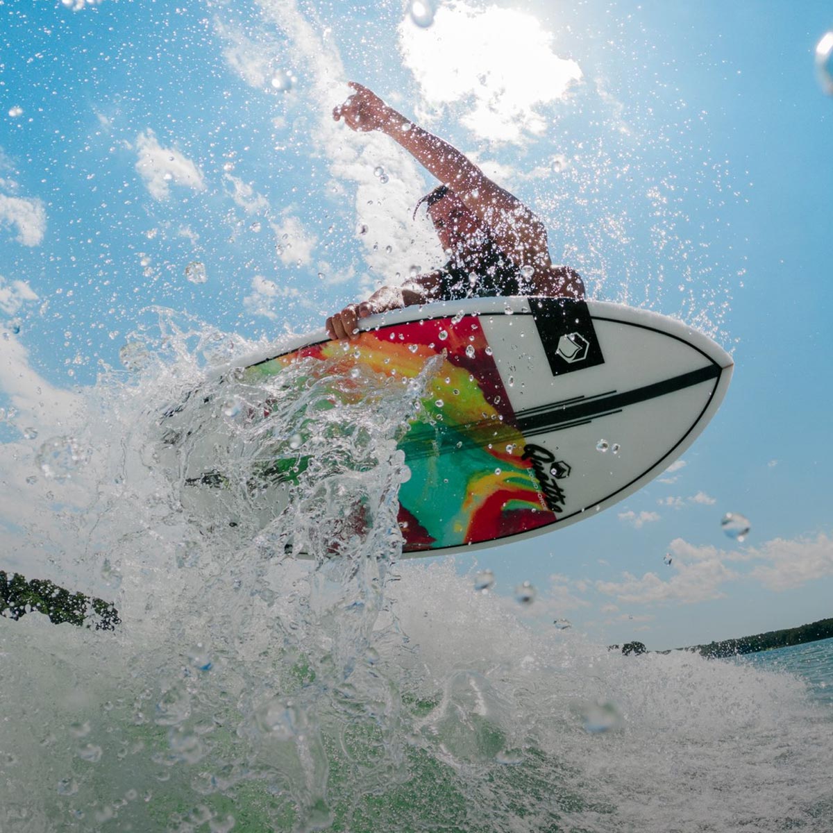 Liquid Force Wakesurf Collection - Closeup shot of LF Athlete Jake Caster riding a wakesurf board