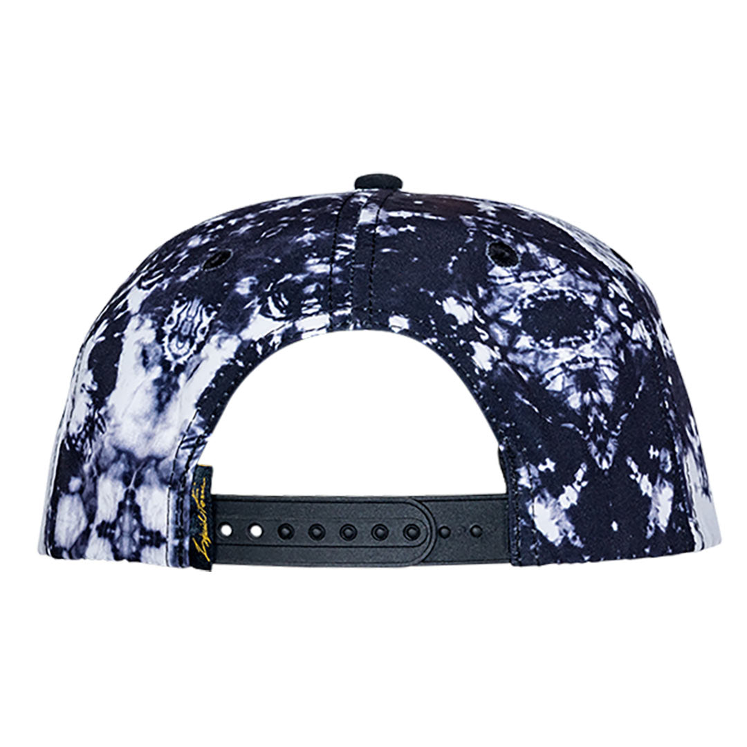 Back view of the Revert Snapback Hat in black and white tie-dye with an adjustable strap.