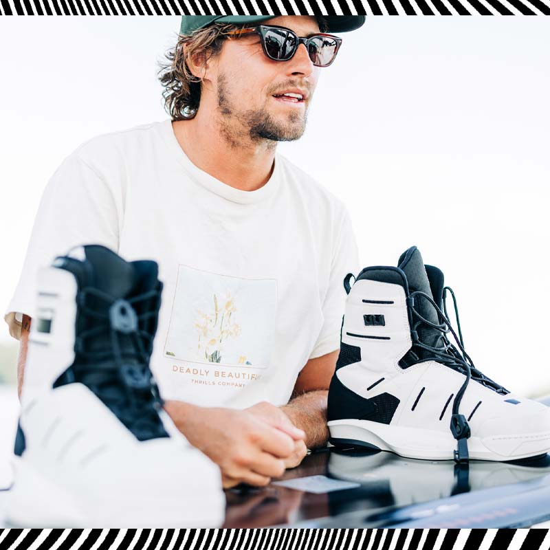 Harley Clifford sitting behind Liquid Force Bindings & Wakeboard