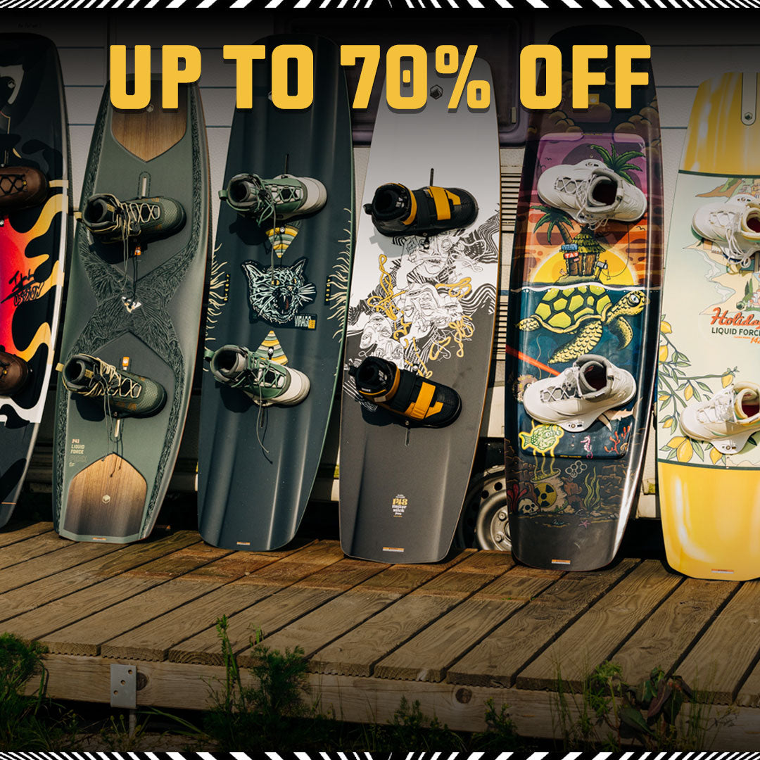Wakeboards with various designs on a wooden platform, promotional text 'UP TO 70% OFF' at the top.