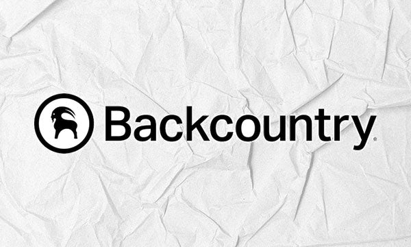 Backcountry logo in black on a white paper texture background.