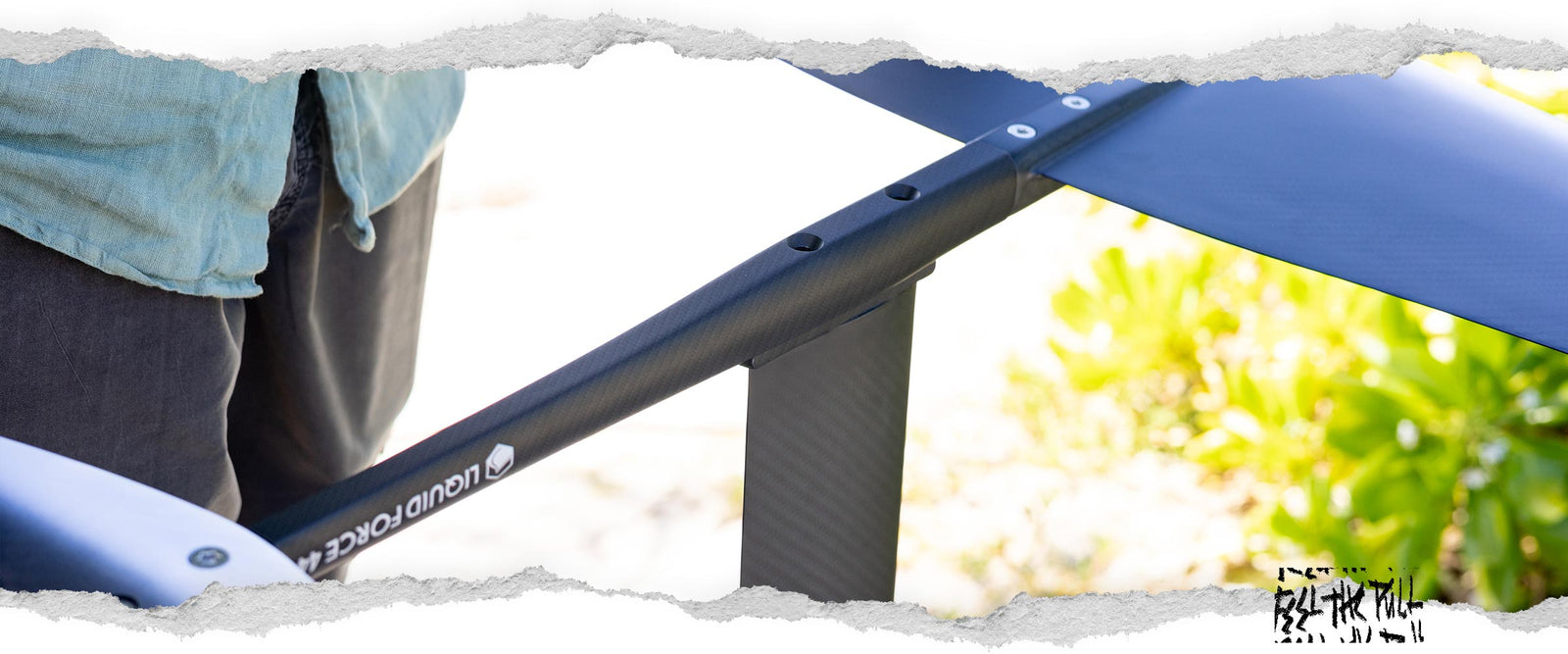 Close-up of Liquid Force carbon foil fuselage in natural light.