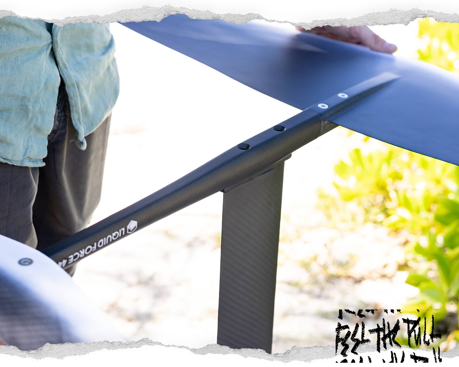 Close-up of Liquid Force carbon foil fuselage in natural light.