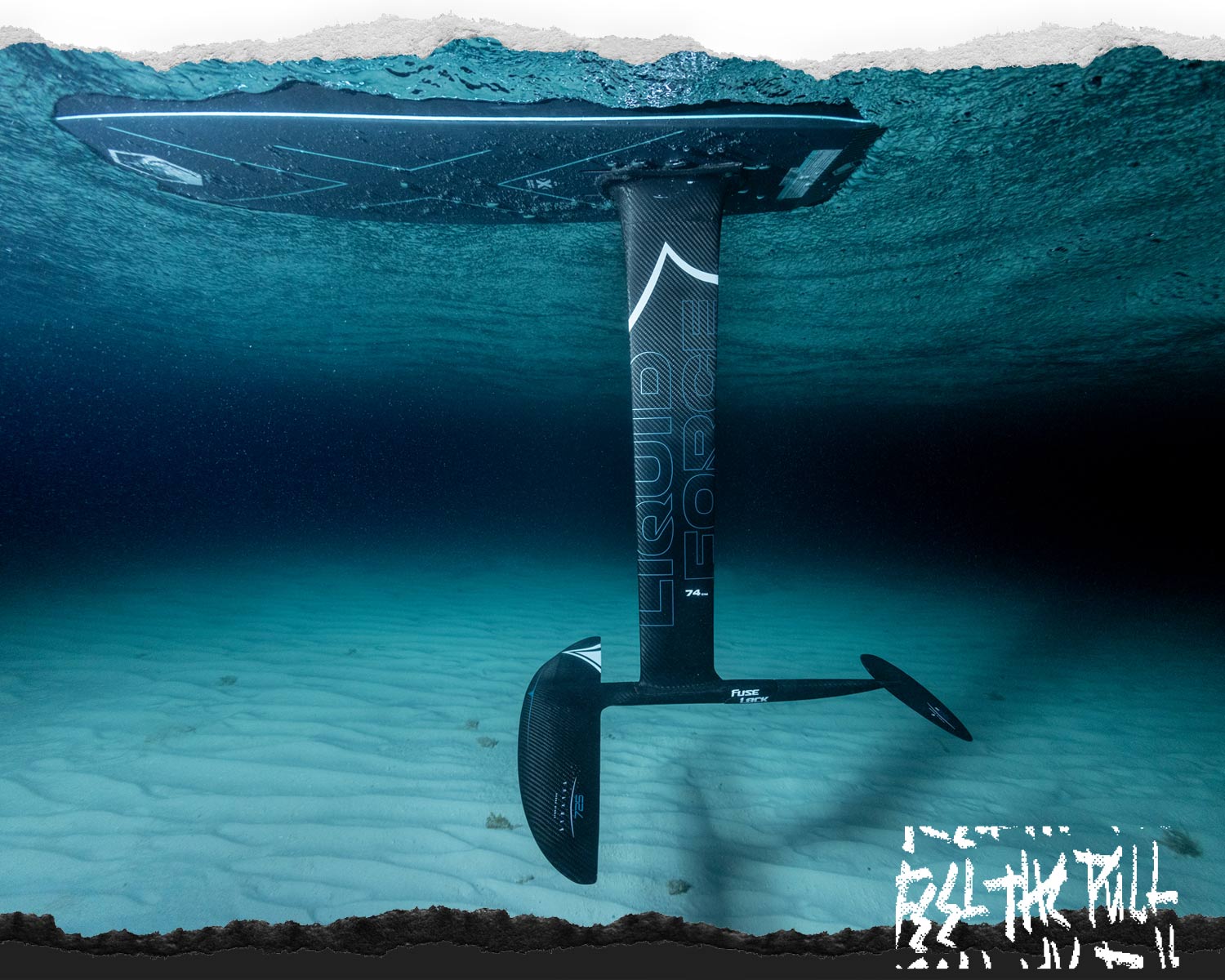 Underwater view of Liquid Force Carbon Stratus foilset gliding beneath the surface.