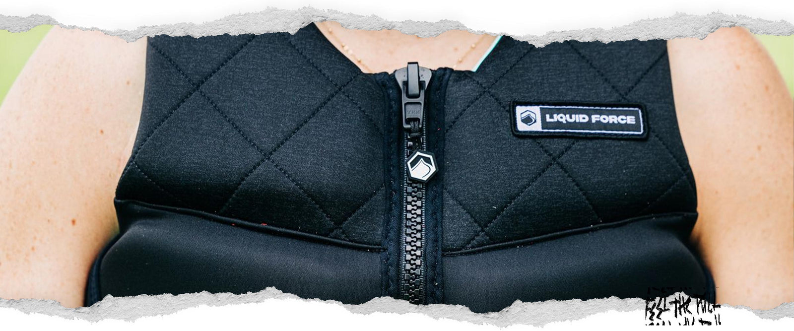 Black Diva Heritage CGA vest with quilted shoulders, front zip, and white Liquid Force patch.