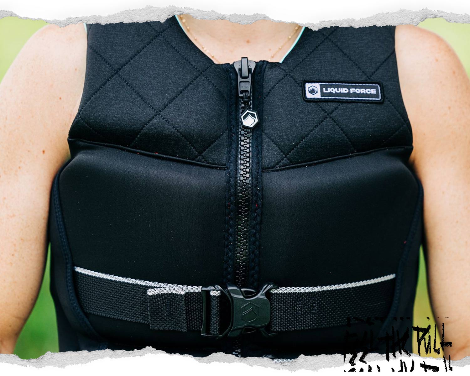 Black Diva Heritage CGA vest with quilted shoulders, front zip, and white Liquid Force patch.