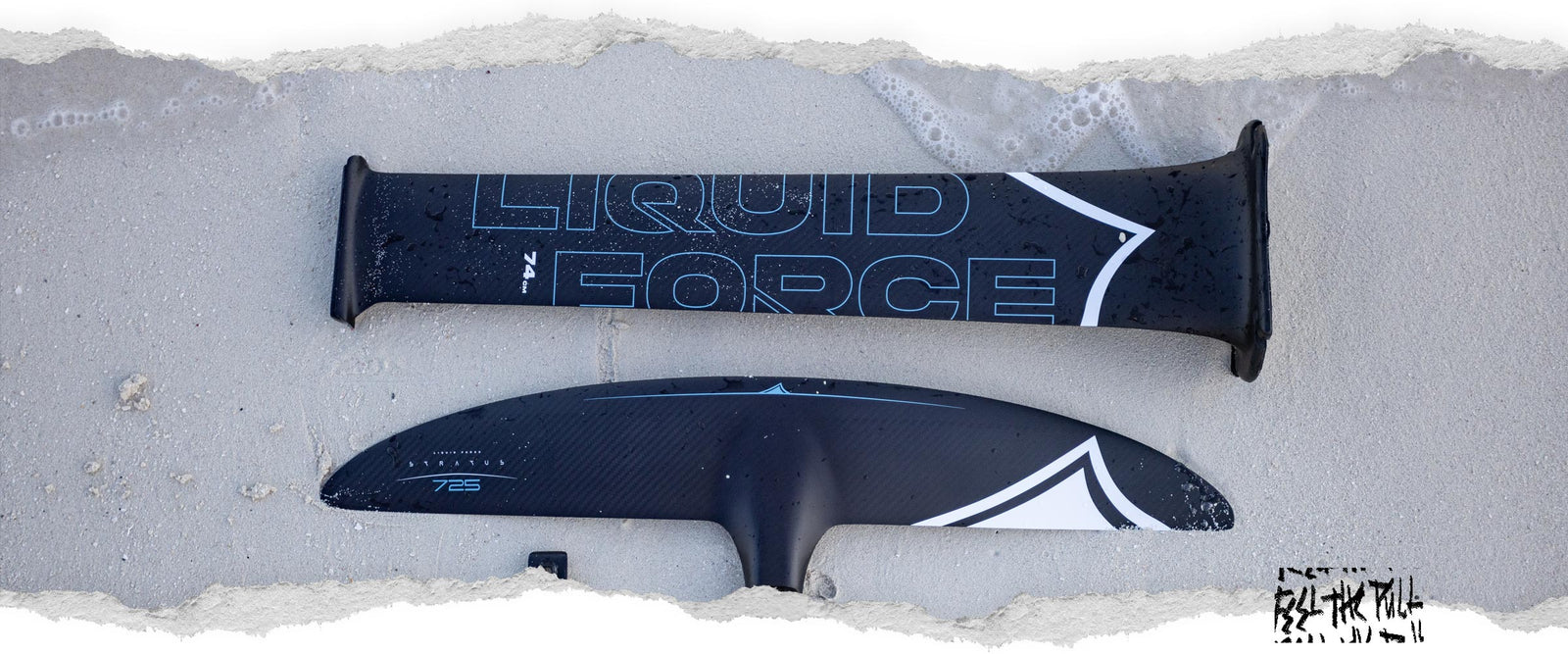 Fuselock 74cm carbon mast and Stratus 725 front wing on wet sand.