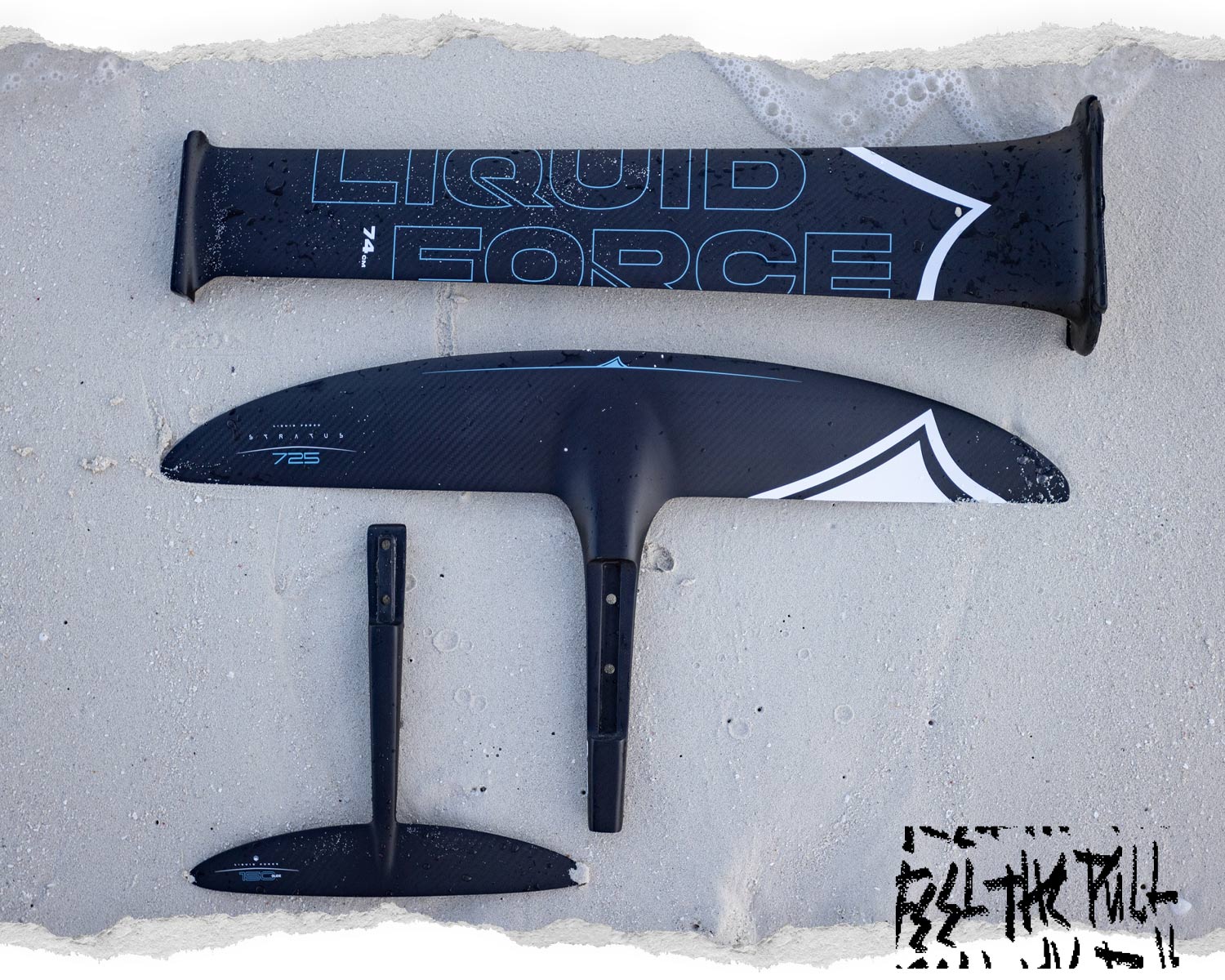 Fuselock 74cm carbon mast and Stratus 725 front wing on wet sand.