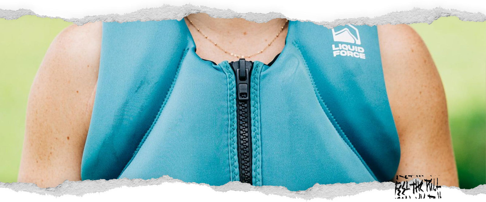 Front view of teal Heartbreaker CGA vest with black zipper and Liquid Force logo.