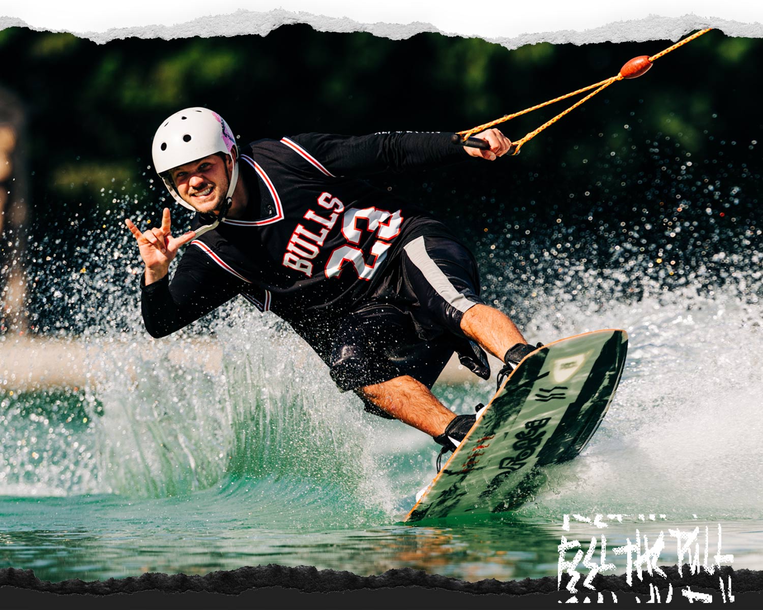 Rider wakeboarding on the Illusion board.