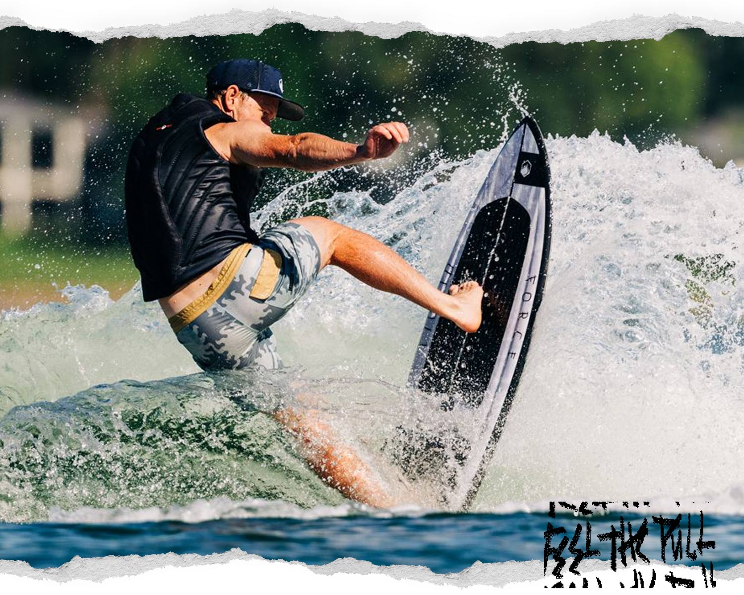 Wakesurfer turning on a wave in camo shorts and black Liquid Force vest.