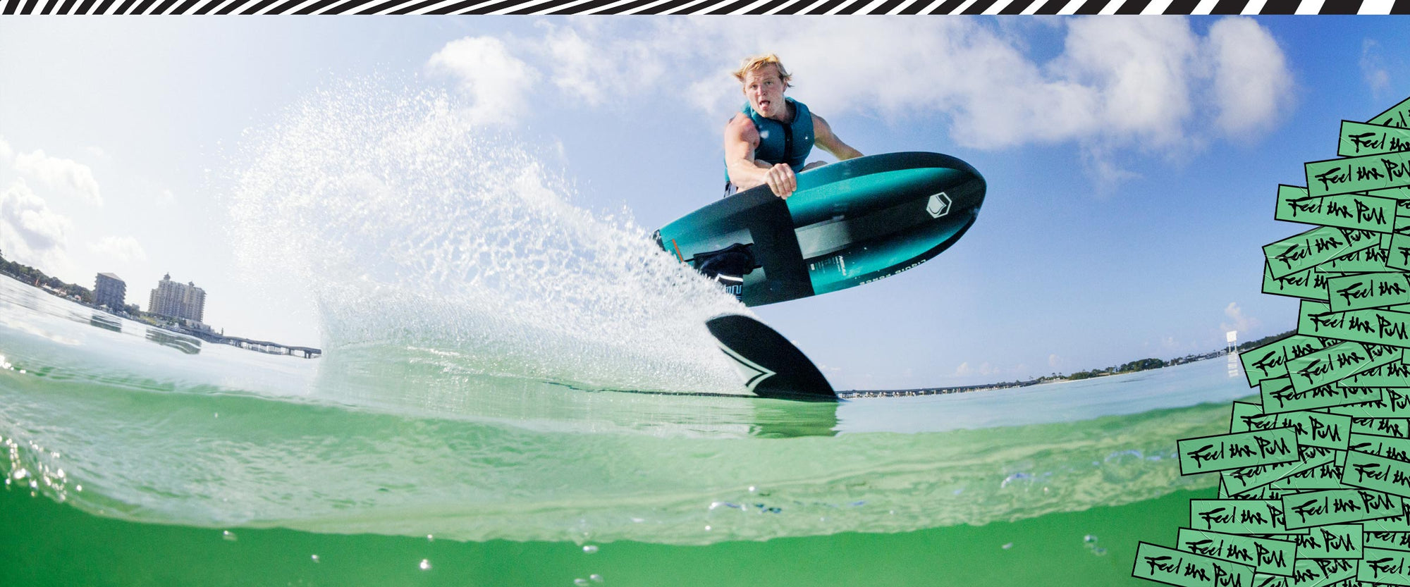 Rider jumps above green water using Carbon Horizon FuseLock hydrofoil setup.