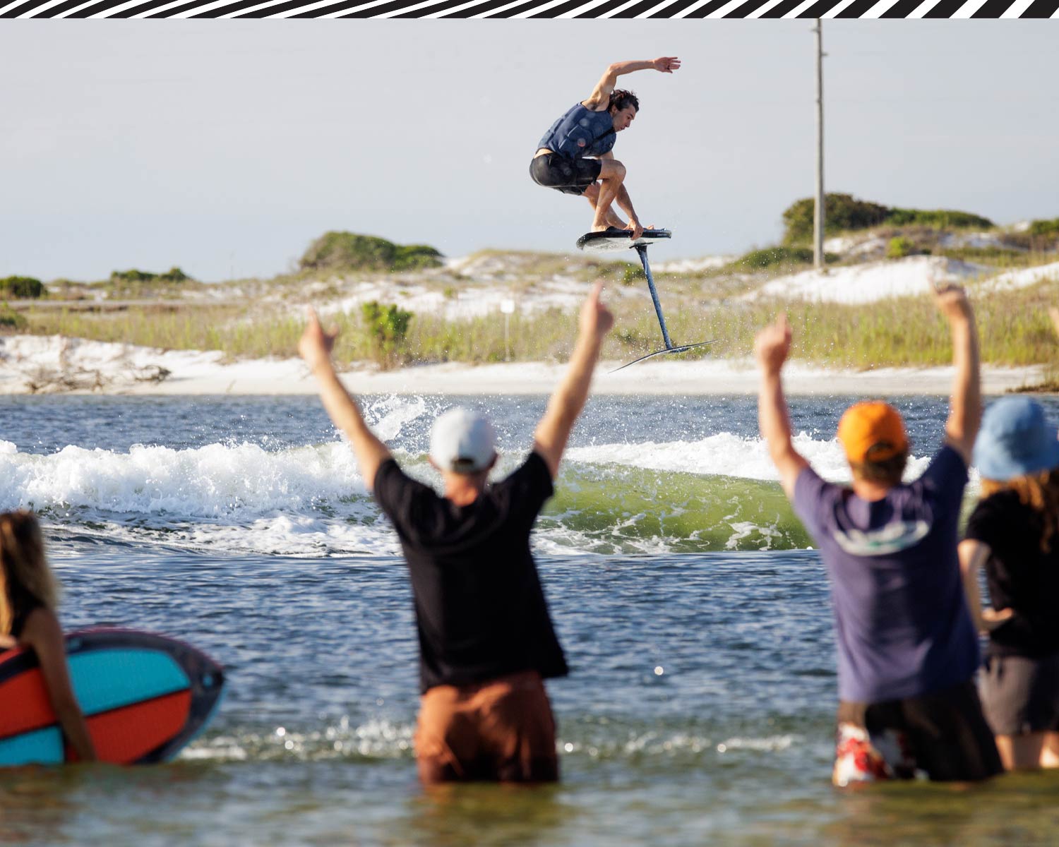 Crowd cheers as rider performs jump using Carbon Stratus 725 FuseLock front wing.