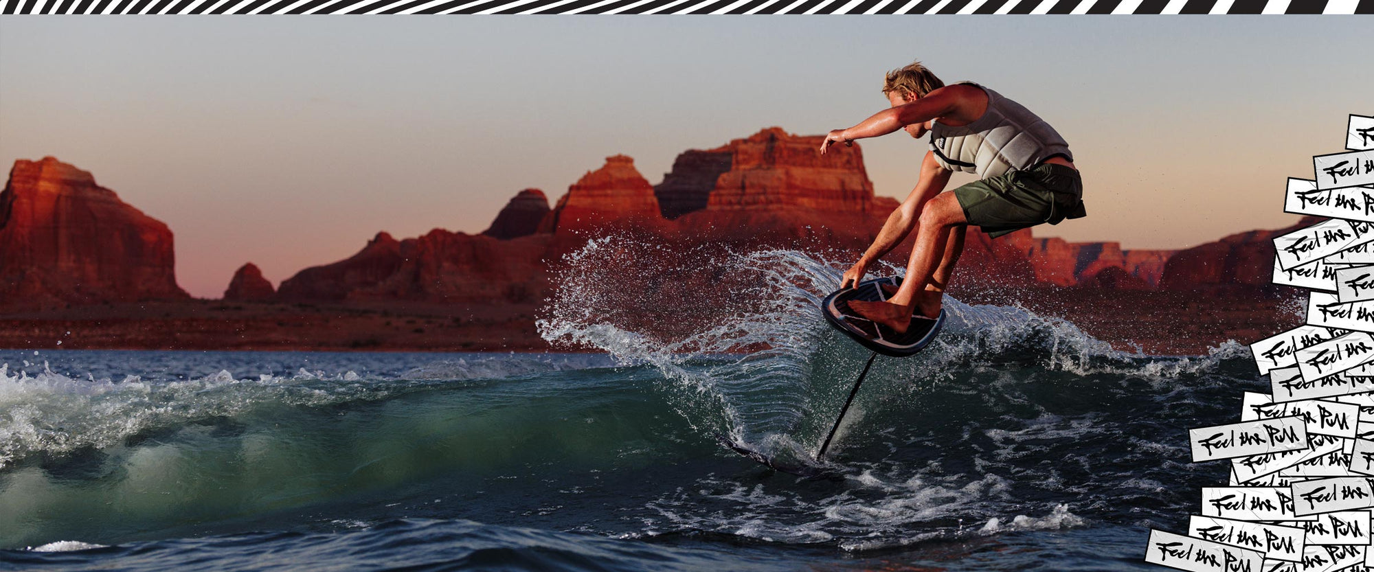 Rider carves across wave at sunset using Carbon Stratus FuseLock foil setup.
