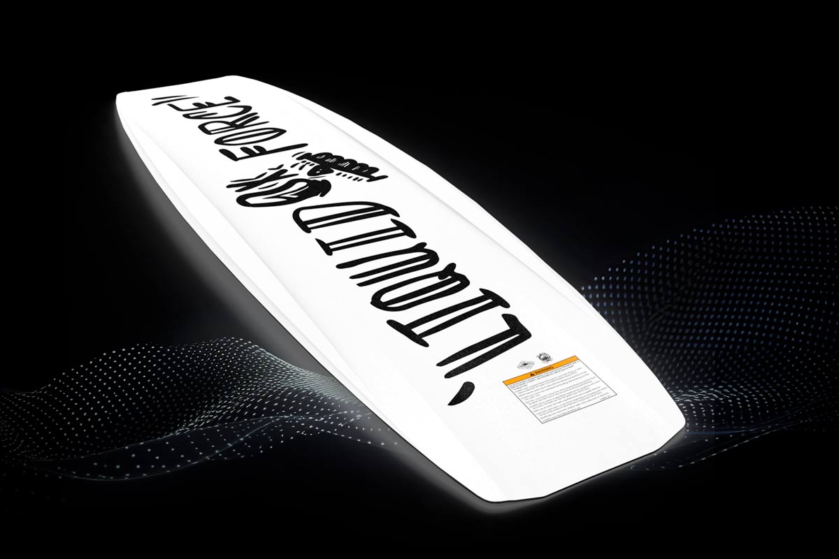 Angled view of white Liquid Force wakeboard with black stacked logo and small graphic detail.