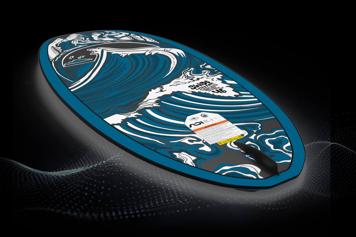 Top view of Atomic Wakesurf Board with blue and white wave artwork.