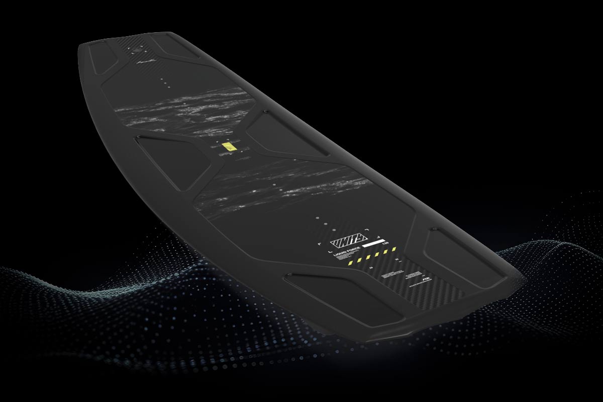 Black wakeboard with 'UNITY' branding and small yellow accents on a dark background.