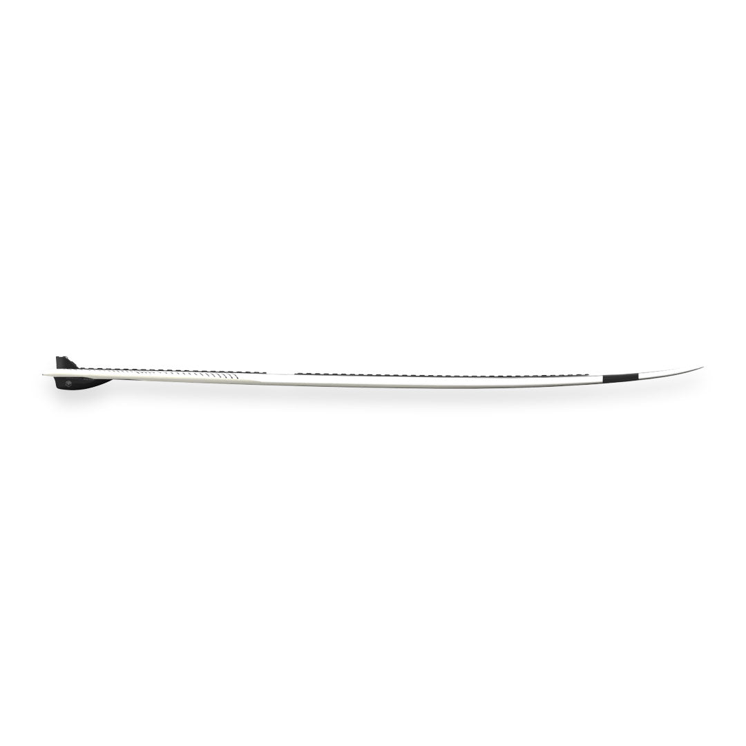 Side view of the 24 TC Skim wakesurf board resembles a thin skim-style board with small arched curve profile on white background.